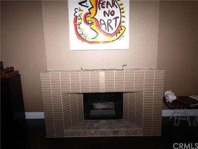 Glass Fireplace w/ Mantle for Family Photos.
