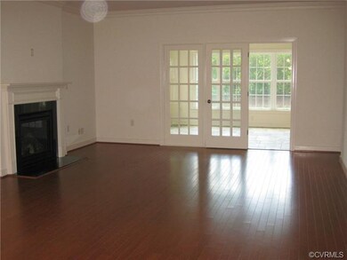 Model Photo; Family Room open to Sunroom