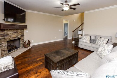 This great room is more than enough space for your sectional arrangement and entertainment center. Imagine your family cuddled up by the fire on your  first movie night this winter!
