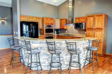 Kitchen. Gorgeous stone-faced island, granite coun