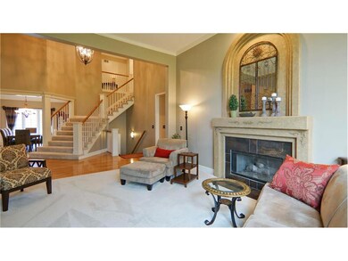 High ceilings, upgraded carpet, and gleaming hardw