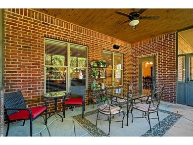 Exterior Back. The screened in patio is truly an o