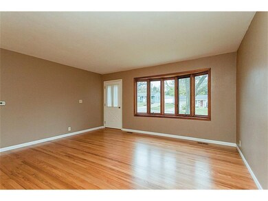 Living room with the original hardwood floors now 
