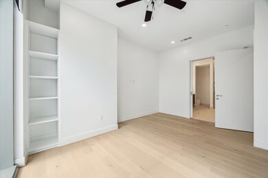 Spacious primary bedroom.