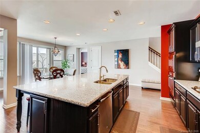 Immense center island in kitchen! Lovely granite c