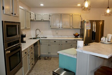 Featuring a built-in oven and microwave and a cook