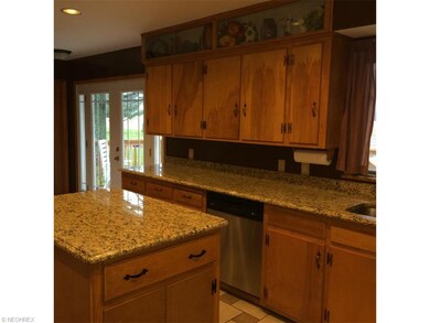 kitchen with French doors out to newer 16 x 12 dec