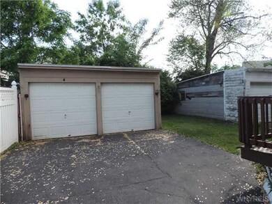 Backyard. The back yard and garage area.