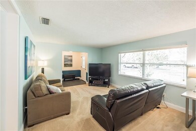 Notice the foyer in the background with updated flooring