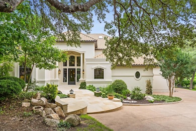 Mediterranean / spanish-style home with a tile ro