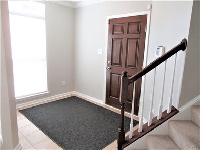 Welcoming Foyer offers Neutral Tile Flooring, Neut