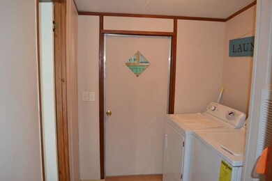 laundry room and rear exit to workshop