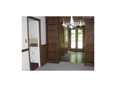 Formal dinling room with built in book cases