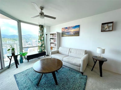 Living room looks toward the green mountain