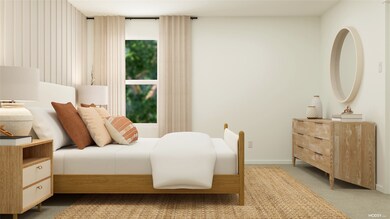 Bedroom featuring carpet floors