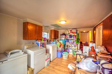 Downstairs Laundry/ Bonus room