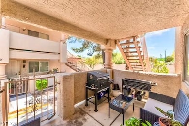 View of patio / terrace featuring stairway, an out