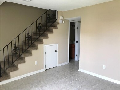 Enter the hallway, you have a half bath and open c