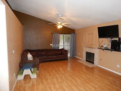 Living Room. Vaulted Ceiling and Fireplace