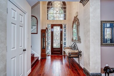 Beautiful teak wood flooring throughout the home -