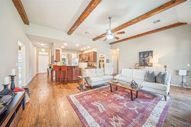 Open concept with handscraped hardwood floors and