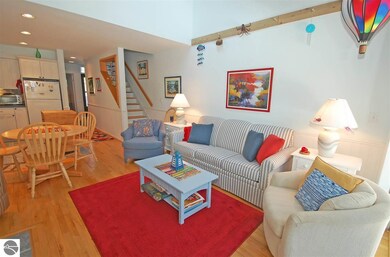 The living area opens up to the dining area and ki