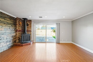 Living room with feature wall and fireplace