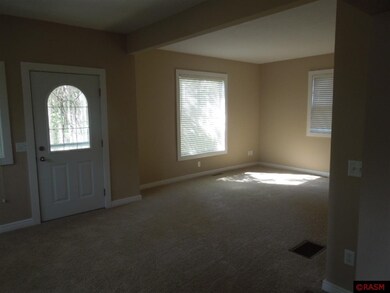 New carpet, windows and gas fireplace makes this a