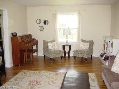and a bright, cheery formal living room that offer