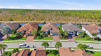 9489 Montelanico Loop, Naples, FL 34119 - photo 3