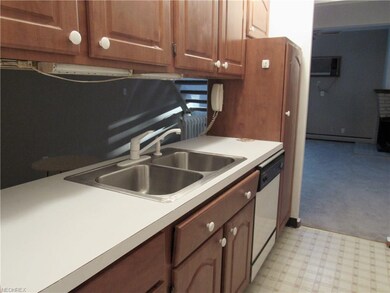 The kitchen has a pass thru to the dining area and