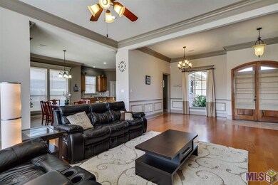 Notice the beautiful hardwood flooring and the ope