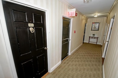 Hallway and entrance to unit 8H