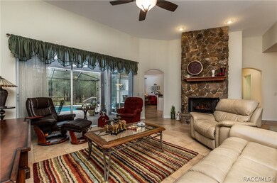 Beautiful Living Room & Fireplace with sliders to
