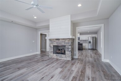 Elegant LVP flooring in Living/dining/kitchen