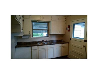 Kitchen. New counter top, sink, paint & flooring. 