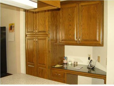 Desk in the Kitchen and Pantry with roll out shelv