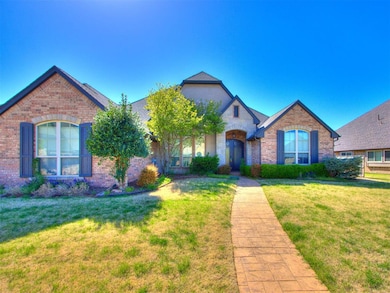 View of front facade featuring a front lawn and br