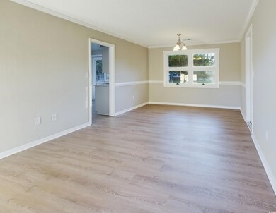 Unfurnished with LVP flooring and molding