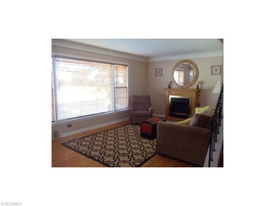 LARGE LIVING ROOM WITH BEAUTIFUL HARDWOOD FLOORING