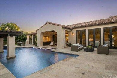 Salt water pool with iridescent glass tile and qua