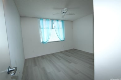 L-side bedrm is bright & airy and has curtains & m