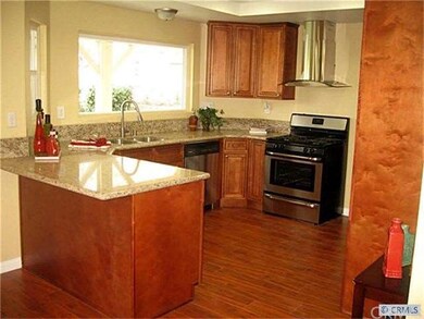 Stainless steel appliances. Great window looking i