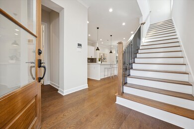 Interior complete with wood flooring throughout