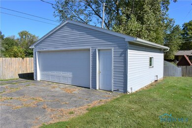 Extra detached garage w/ opener.