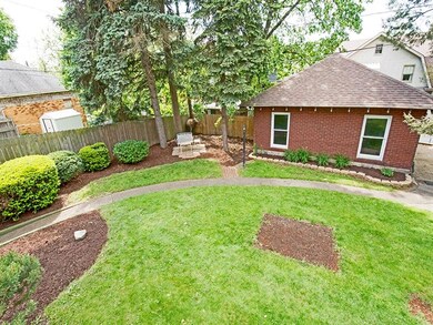 Freshly landscaped for spring!  One car detached g