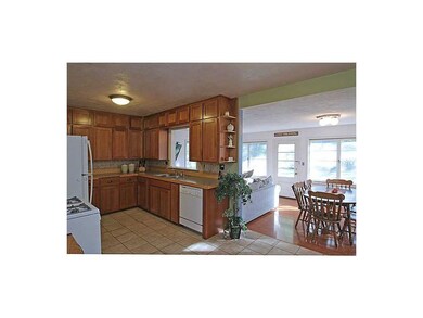 Kitchen. Kitchen opens to bonus room / dining area