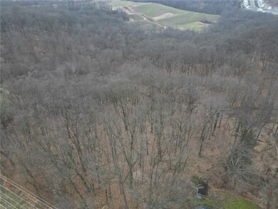 Over 7 acres of lush hardwood trees