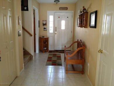 Large Foyer with Ceramic Tile