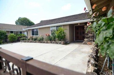 Front porch area with enclosed fencing. 